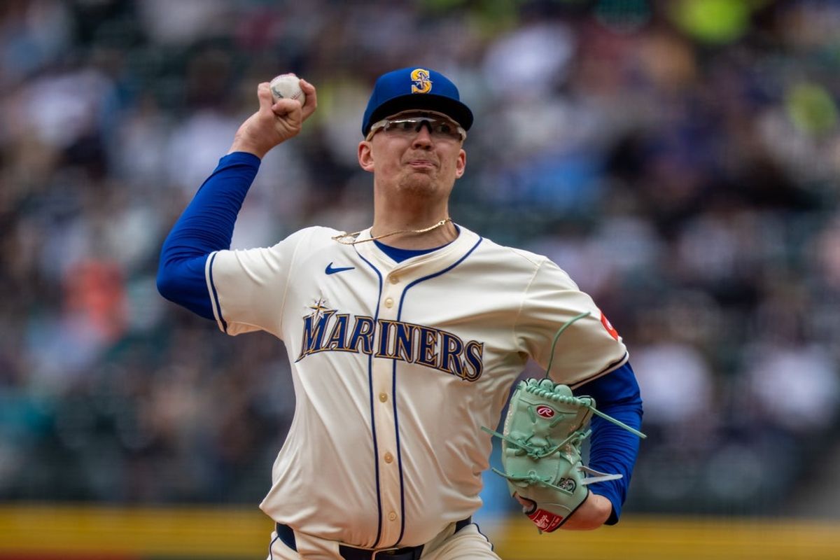 Apr 27, 2025; Seattle, Washington, USA;  Seattle Mariners starter Logan Evans (73) delivers a pitch against the Miami Marlins at T-Mobile Park. Mandatory Credit: Stephen Brashear-Imagn Images
