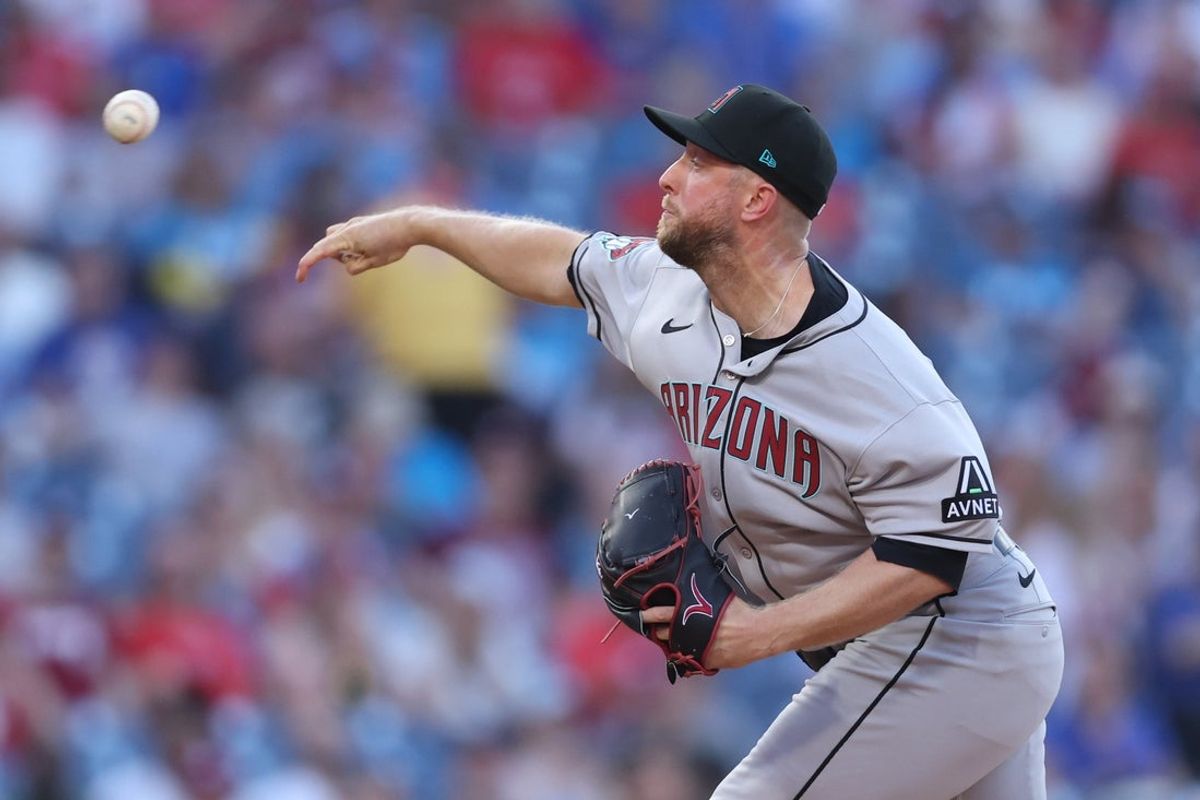 May 2, 2025; Philadelphia, Pennsylvania, USA; Arizona Diamondbacks pitcher Merrill Kelly (29) pitches against the Philadelphia Phillies during the first inning at Citizens Bank Park. Mandatory Credit: Bill Streicher-Imagn Images