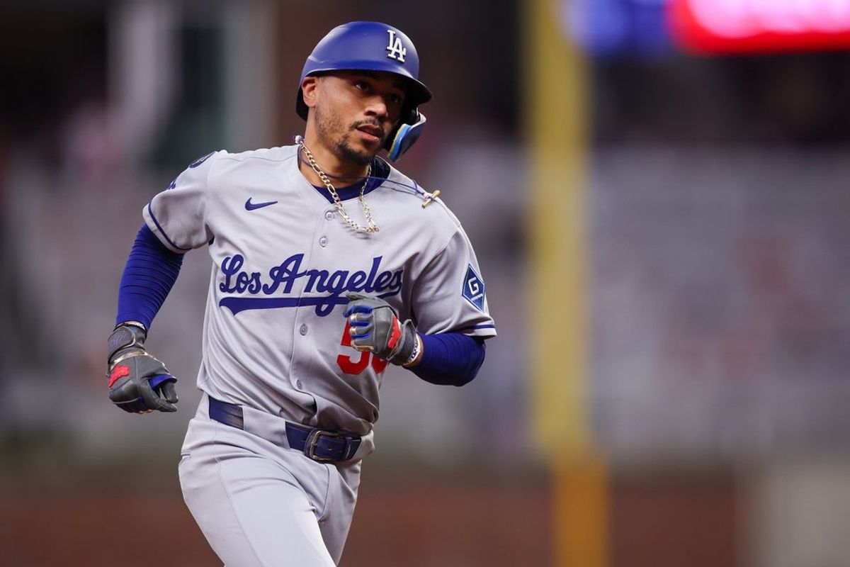 May 2, 2025; Atlanta, Georgia, USA; Los Angeles Dodgers shortstop Mookie Betts (50) rounds the bases after a home run against the Atlanta Braves in the sixth inning at Truist Park. Mandatory Credit: Brett Davis-Imagn Images