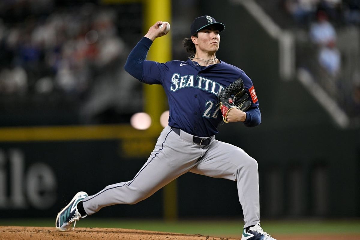 May 2, 2025; Arlington, Texas, USA; Seattle Mariners starting pitcher Bryan Woo (22) pitches against the Texas Rangers during the first inning at Globe Life Field. Mandatory Credit: Jerome Miron-Imagn Images
