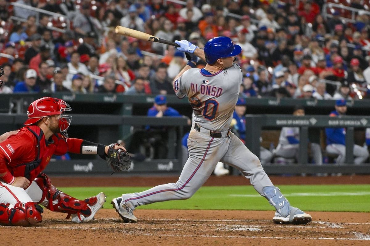 May 2, 2025; St. Louis, Missouri, USA;  New York Mets first baseman Pete Alonso (20) hits a two run home run against the St. Louis Cardinals during the fifth inning at Busch Stadium. Mandatory Credit: Jeff Curry-Imagn Images
