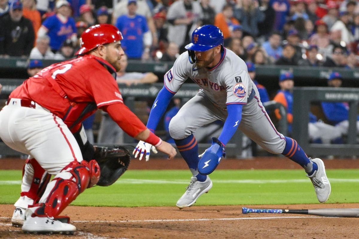 May 2, 2025; St. Louis, Missouri, USA;  New York Mets left fielder Brandon Nimmo (9) scores against St. Louis Cardinals catcher Pedro Pages (43) during the fifth inning at Busch Stadium. Mandatory Credit: Jeff Curry-Imagn Images