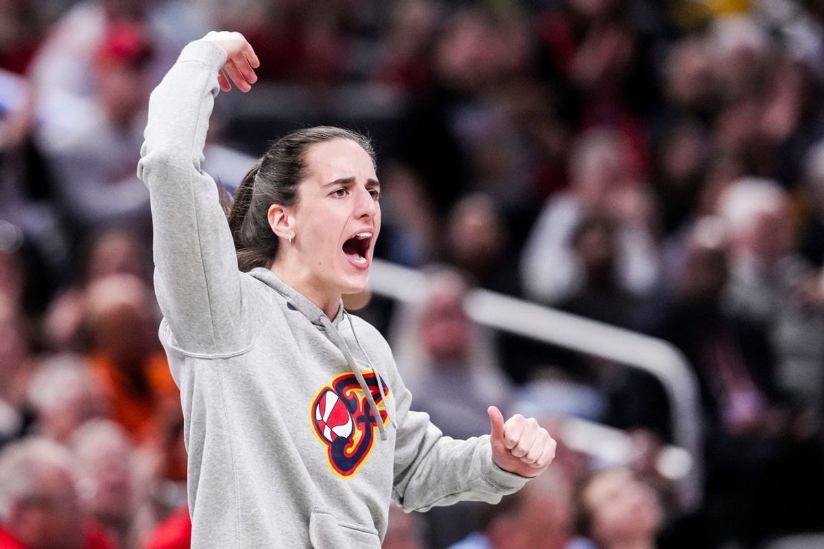 Indiana Fever Caitlin Clark (22) gets the crowd excited Saturday, May 3, 2025, during a preseason game between the Indiana Fever and the Washington Mystics at Gainbridge Fieldhouse in Indianapolis.