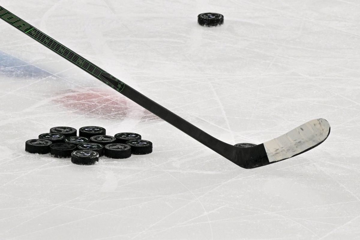 May 3, 2025; Dallas, Texas, USA; A view of a hockey stick and pucks before the game between the Dallas Stars and the Colorado Avalanche in game seven of the first round of the 2025 Stanley Cup Playoffs at American Airlines Center. Mandatory Credit: Jerome Miron-Imagn Images