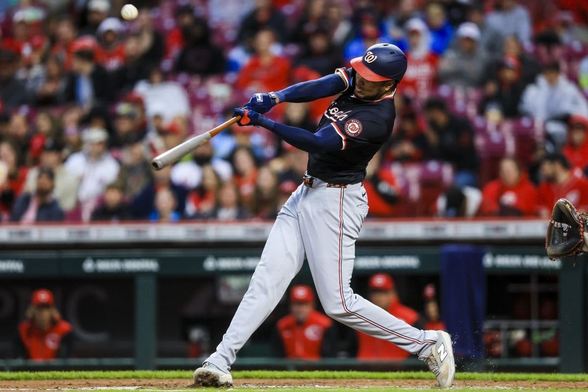 May 3, 2025; Cincinnati, Ohio, USA; Washington Nationals designated hitter James Wood (29) hits a double in the third inning against the Cincinnati Reds at Great American Ball Park. Mandatory Credit: Katie Stratman-Imagn Images
