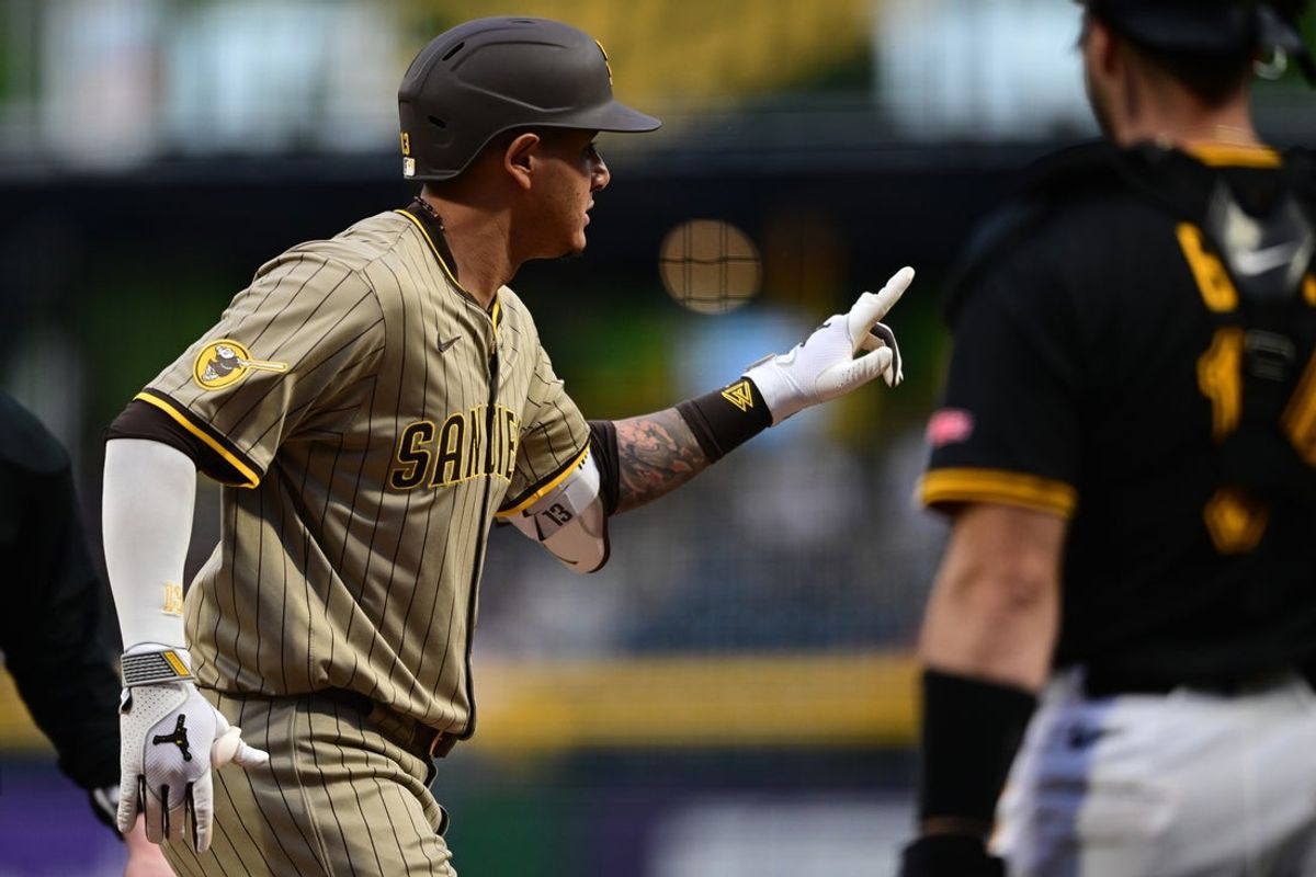May 3, 2025; Pittsburgh, Pennsylvania, USA; San Diego Padres third baseman Manny Machado (13) celebrates after hitting a solo home run off Pittsburgh Pirates starting pitcher Bailey Falter (6) during the seventh inning at PNC Park. Mandatory Credit: David Dermer-Imagn Images