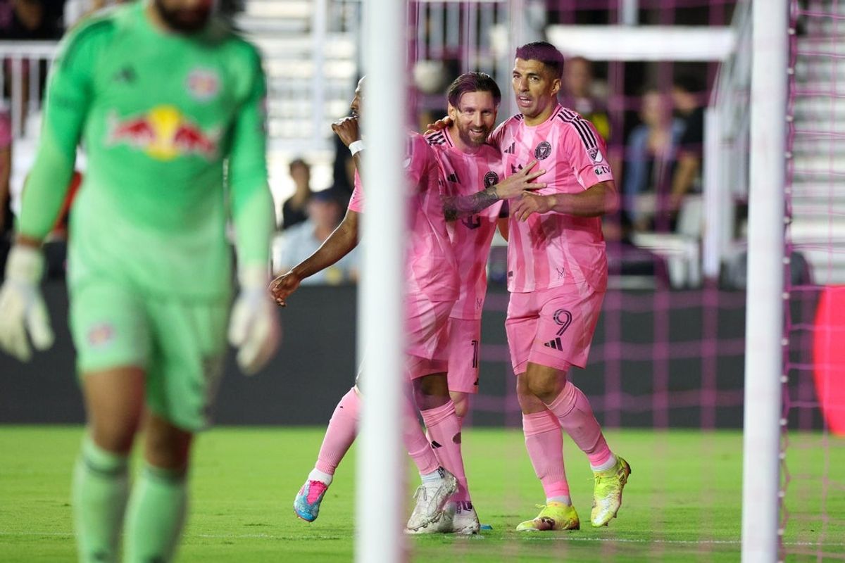 May 3, 2025; Fort Lauderdale, Florida, USA; Inter Miami CF forward Luis Suarez (9) celebrates with forward Lionel Messi (10) after scoring a goal against the New York Red Bulls in the first half  at Chase Stadium. Mandatory Credit: Nathan Ray Seebeck-Imagn Images