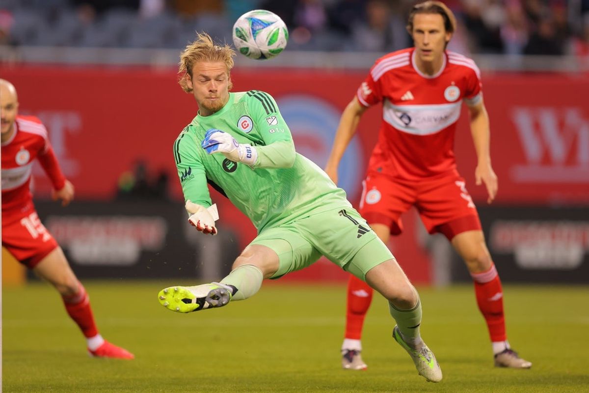 May 3, 2025; Chicago, Illinois, USA; Chicago Fire FC goalkeeper Chris Brady (1) makes a save during the first half against Orlando City at Soldier Field. Mandatory Credit: Melissa Tamez-Imagn Images