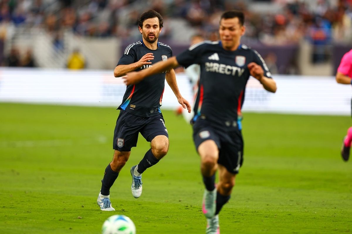 May 3, 2025; San Diego, California, USA; San Diego FC midfielder Luca De La Torre (14) passes to midfielder Hirving Lozano (11) during the first half against FC Dallas at Snapdragon Stadium. Mandatory Credit: Chadd Cady-Imagn Images