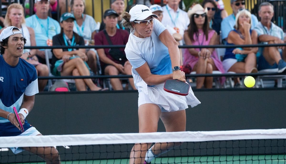 Megan Fudge returns the ball during the Mixed Pro doubles gold medal match at the Minto U.S. Open Pickleball Championships at East Naples Community Park on Saturday, May 3, 2025. She and her partner, Jack Munro won the match
