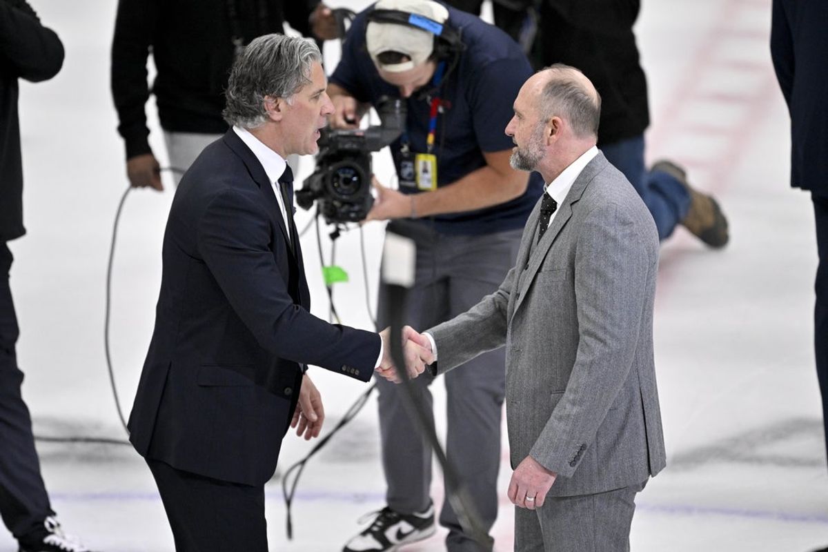 May 3, 2025; Dallas, Texas, USA; Colorado Avalanche head coach Jared Bednar shakes hands with Dallas Stars head coach Peter DeBoer after the Stars defeats the Avalanche in game seven of the first round of the 2025 Stanley Cup Playoffs at American Airlines Center. Mandatory Credit: Jerome Miron-Imagn Images