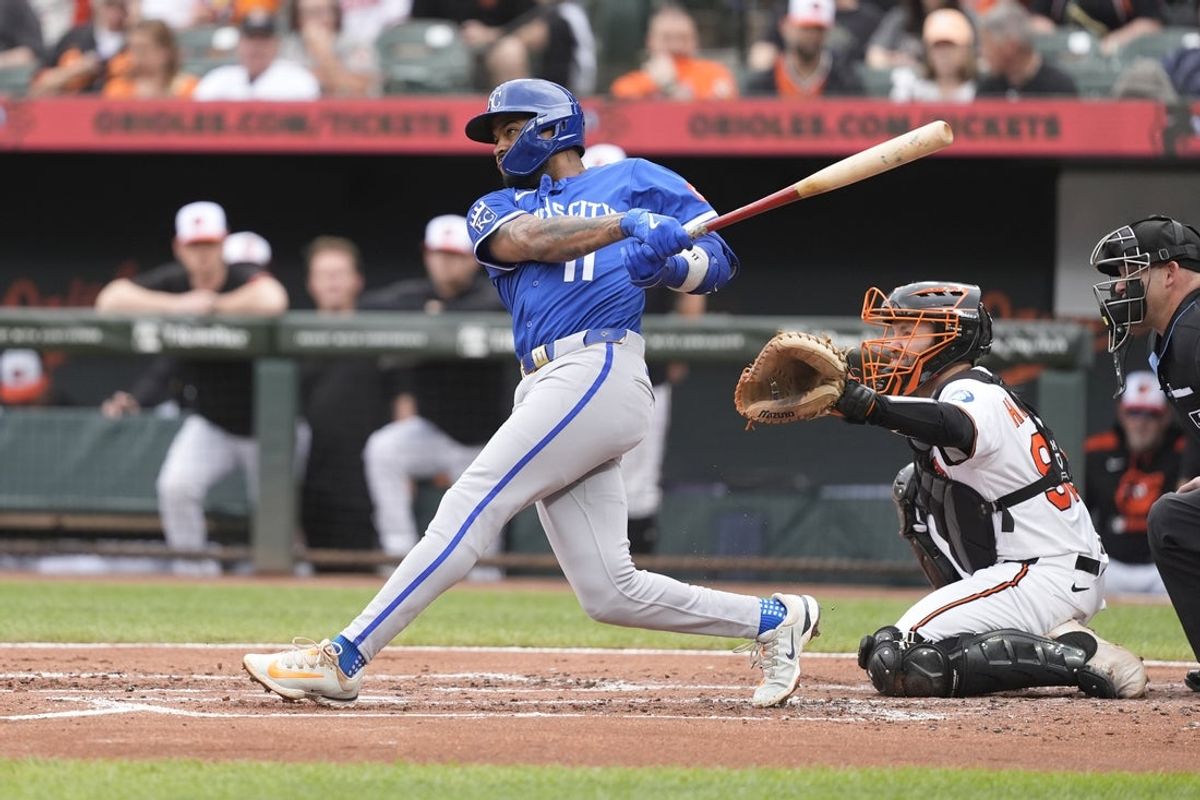 May 4, 2025; Baltimore, Maryland, USA; Kansas City Royals third baseman Maikel Garcia (11) hits a home run against the Baltimore Orioles during the second inning at Oriole Park at Camden Yards. Mandatory Credit: Gregory Fisher-Imagn Images