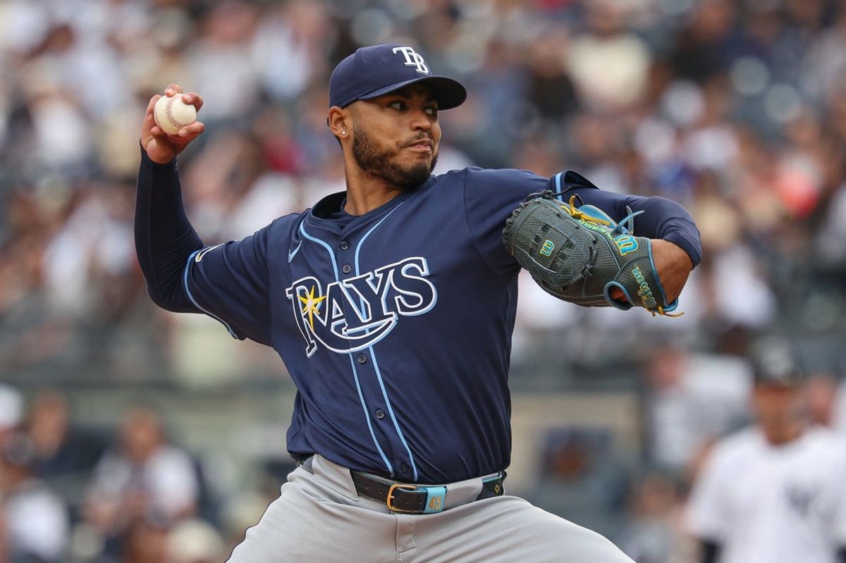 May 4, 2025; Bronx, New York, USA; Tampa Bay Rays starting pitcher Taj Bradley (45) delivers a pitch during the first inning against the New York Yankees at Yankee Stadium. Mandatory Credit: Vincent Carchietta-Imagn Images
