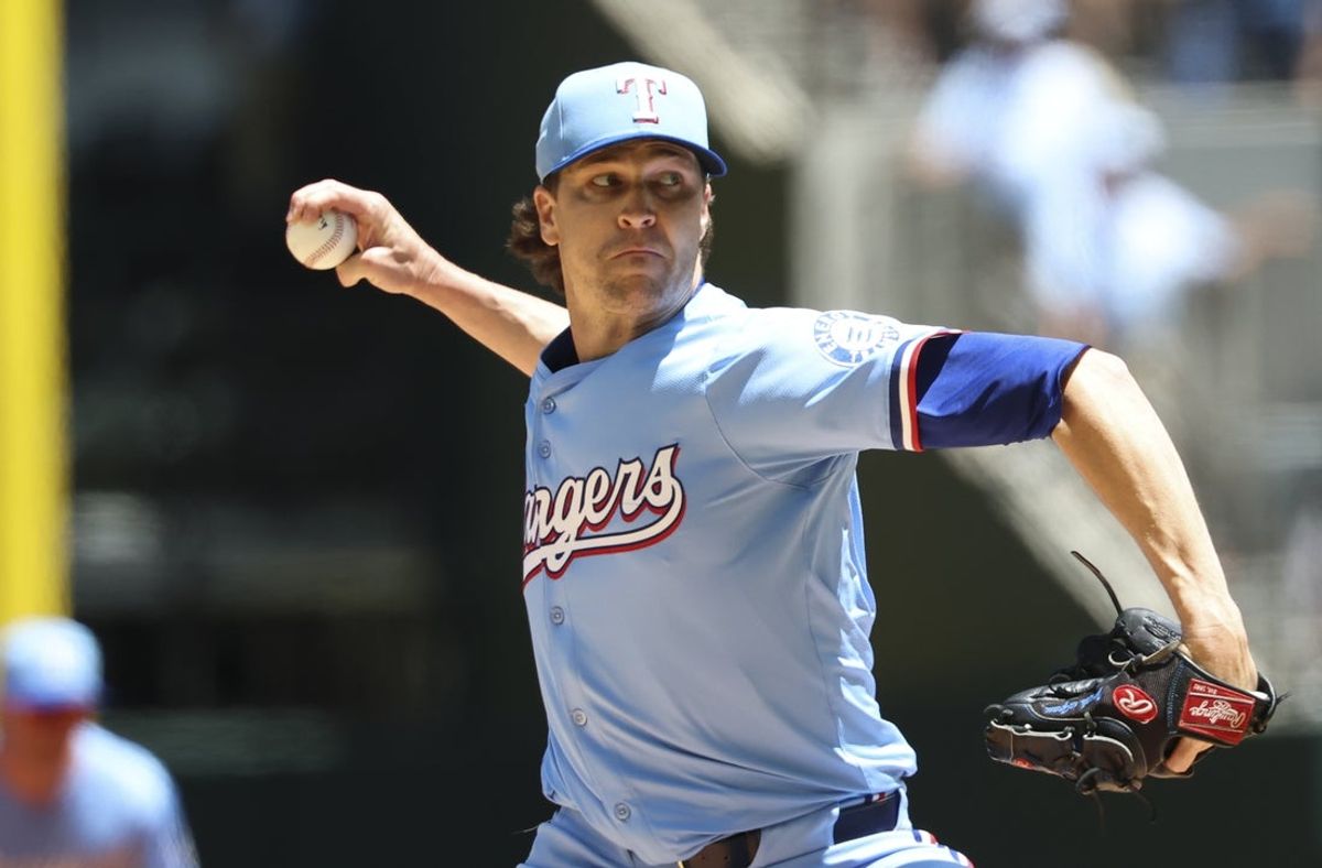May 4, 2025; Arlington, Texas, USA;  Texas Rangers starting pitcher Jacob deGrom (48) throws during the first inning against the Seattle Mariners at Globe Life Field. Mandatory Credit: Kevin Jairaj-Imagn Images