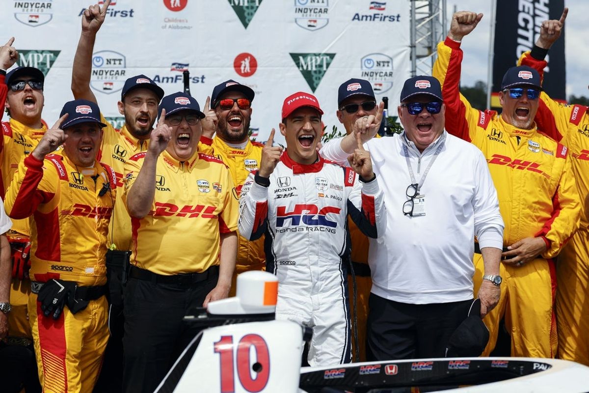 May 4, 2025; Birmingham, Alabama, USA;  Chip Ganassi Racing driver Alex Palou (10) of Spain celebrates with team after a win at Barber Motorsports Park. Mandatory Credit: Butch Dill-Imagn Images
