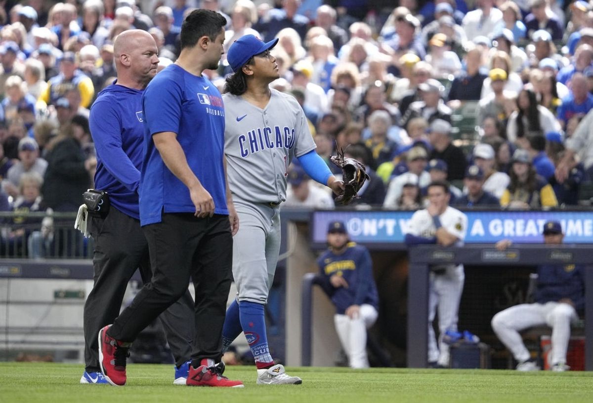 May 4, 2025; Milwaukee, Wisconsin, USA; Chicago Cubs pitcher Shota Imanaga (18) walks off the field after being injured against the Milwaukee Brewers in the sixth inning at American Family Field. Mandatory Credit: Michael McLoone-Imagn Images