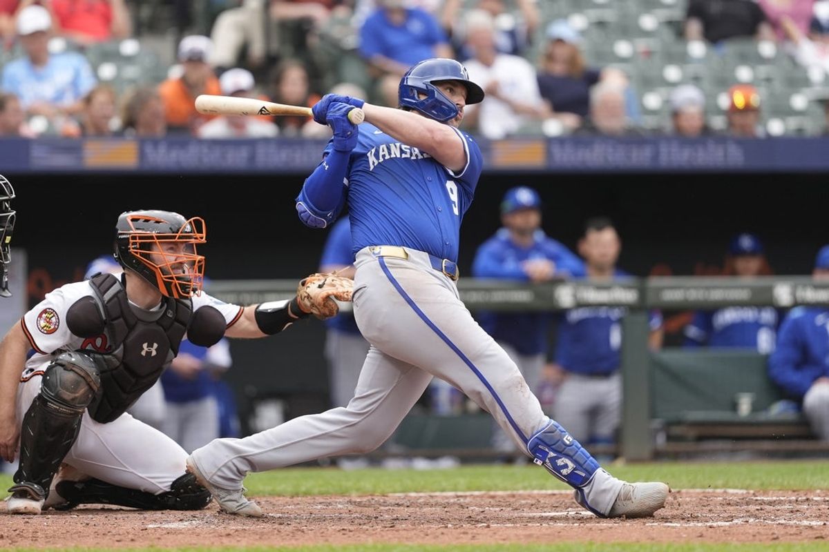 May 4, 2025; Baltimore, Maryland, USA; Kansas City Royals first baseman Vinnie Pasquantino (9) hits a home run against the Baltimore Orioles during the seventh inning at Oriole Park at Camden Yards. Mandatory Credit: Gregory Fisher-Imagn Images