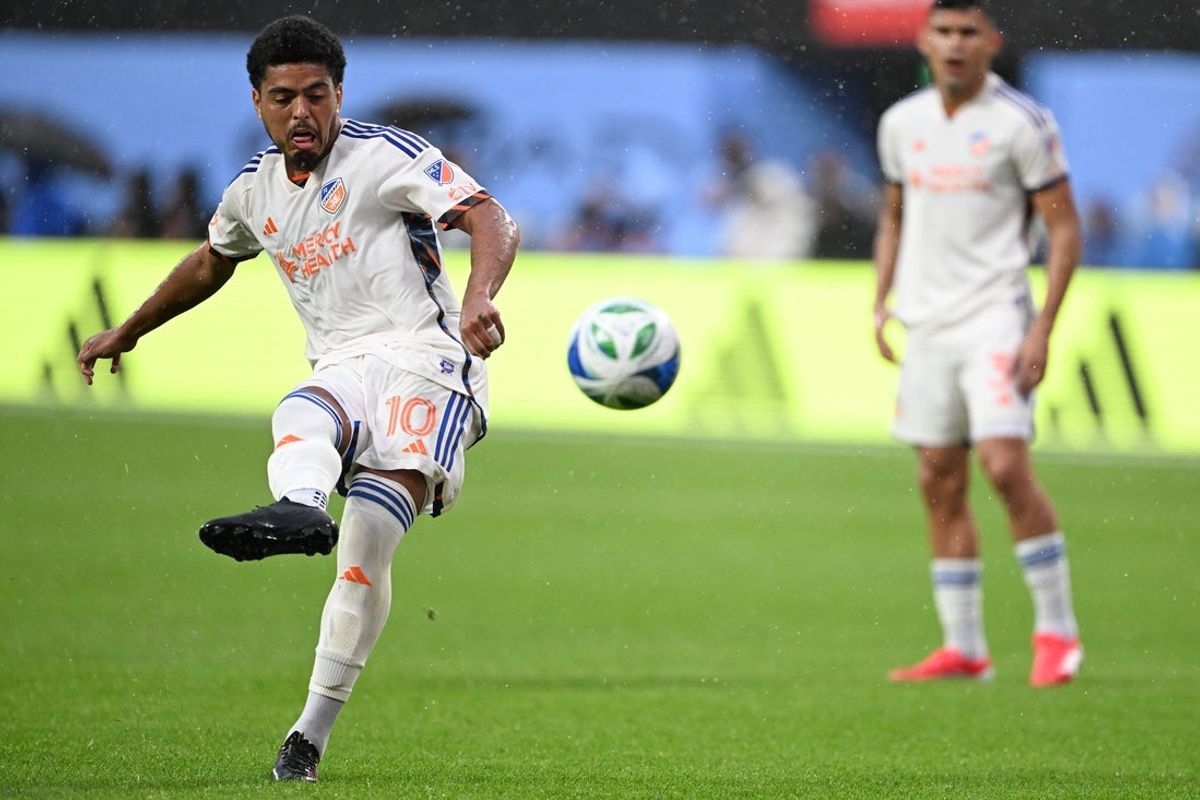 May 4, 2025; New York, NY, USA; FC Cincinnati midfielder Evander (10) shoots the ball during the second half against New York City FC at Citi Field. Mandatory Credit: Mark Smith-Imagn Images