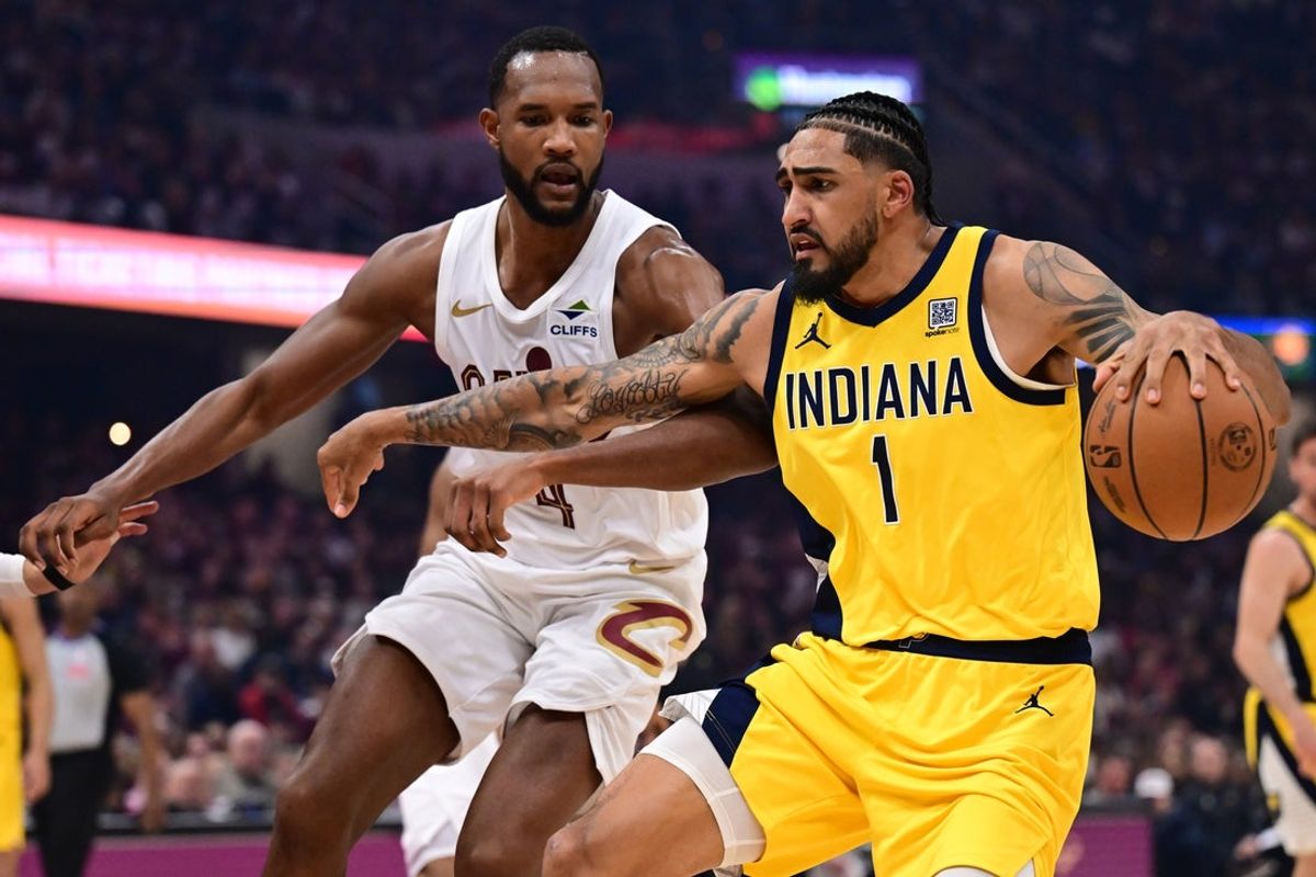 May 4, 2025; Cleveland, Ohio, USA; Indiana Pacers forward Obi Toppin (1) drives to the basket against Cleveland Cavaliers forward Evan Mobley (4) during the first half in game one of the second round for the 2025 NBA Playoffs at Rocket Arena. Mandatory Credit: Ken Blaze-Imagn Images