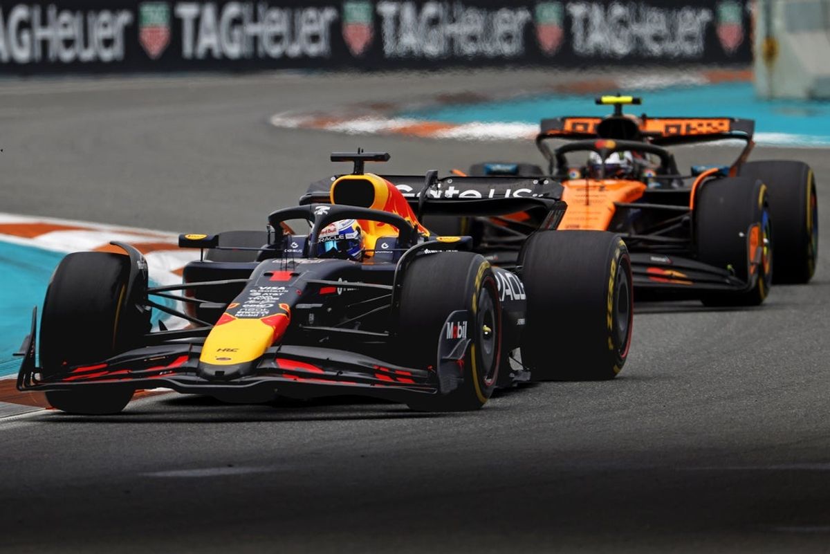 May 4, 2025; Miami Gardens, FL, USA;  Red Bull driver Max Verstappen (1) leads McLaren driver Lando Norris (4) during the F1 Miami Grand Prix at Miami International Autodrome. Mandatory Credit: Peter Casey-Imagn Images