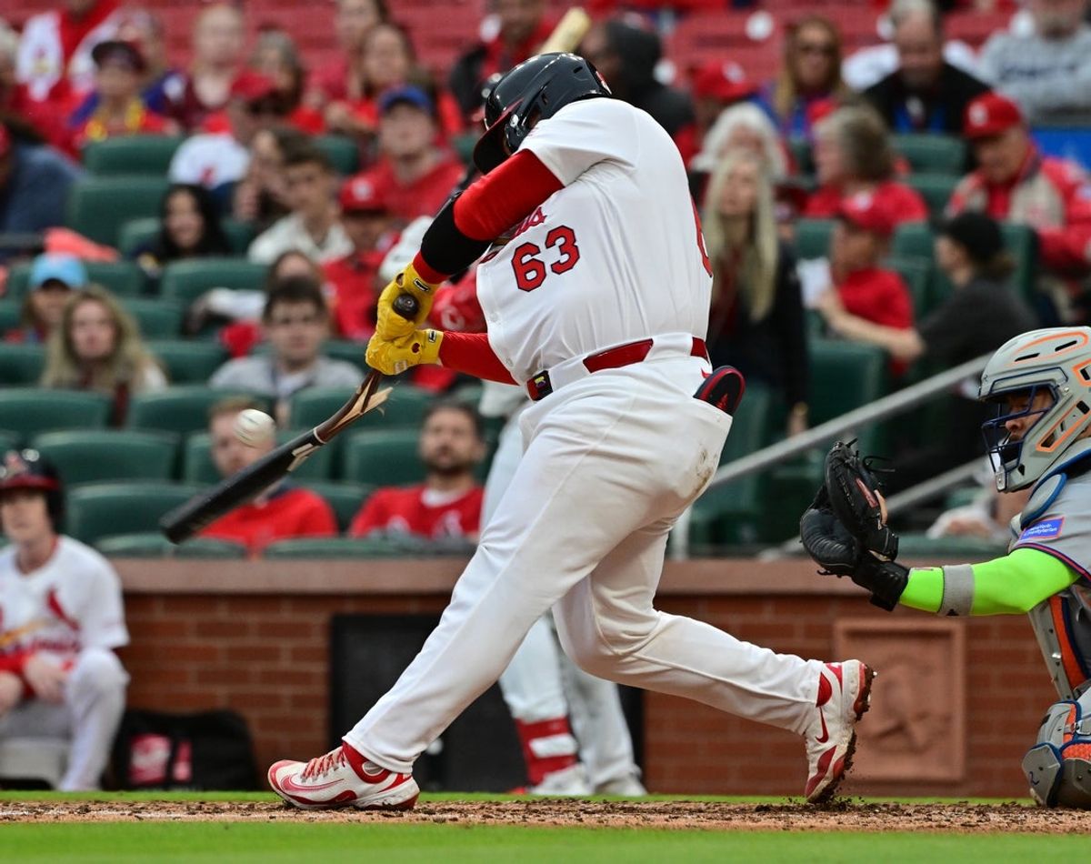May 4, 2025; St. Louis, Missouri, USA;  St. Louis Cardinals catcher Yohel Pozo (63) breaks his bat in the fourth inning against the New York Mets at Busch Stadium. Mandatory Credit: Tim Vizer-Imagn Images