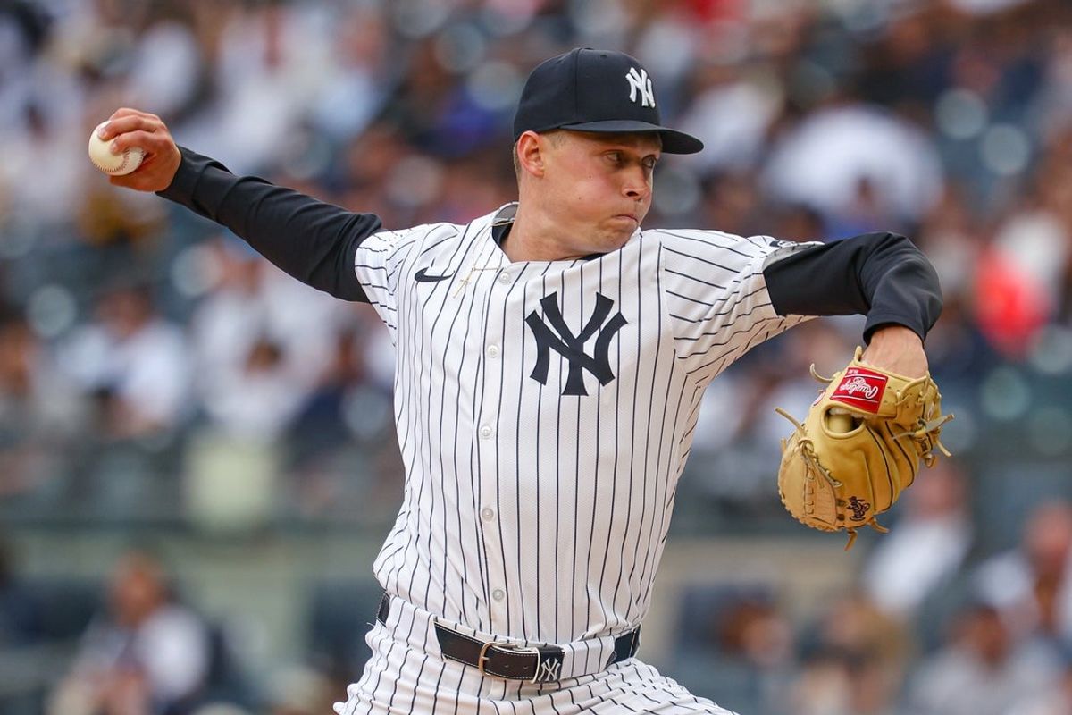 May 4, 2025; Bronx, New York, USA; New York Yankees starting pitcher Will Warren (98) delivers a pitch during the first inning against the Tampa Bay Rays at Yankee Stadium. Mandatory Credit: Vincent Carchietta-Imagn Images