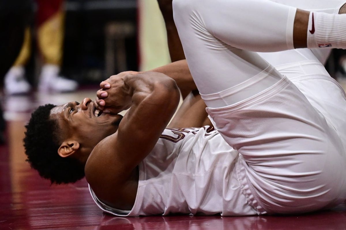 May 4, 2025; Cleveland, Ohio, USA; Cleveland Cavaliers forward De'Andre Hunter (12) reacts after being knocked down during the second half against the Indiana Pacers in game one of the second round for the 2025 NBA Playoffs at Rocket Arena. Mandatory Credit: Ken Blaze-Imagn Images