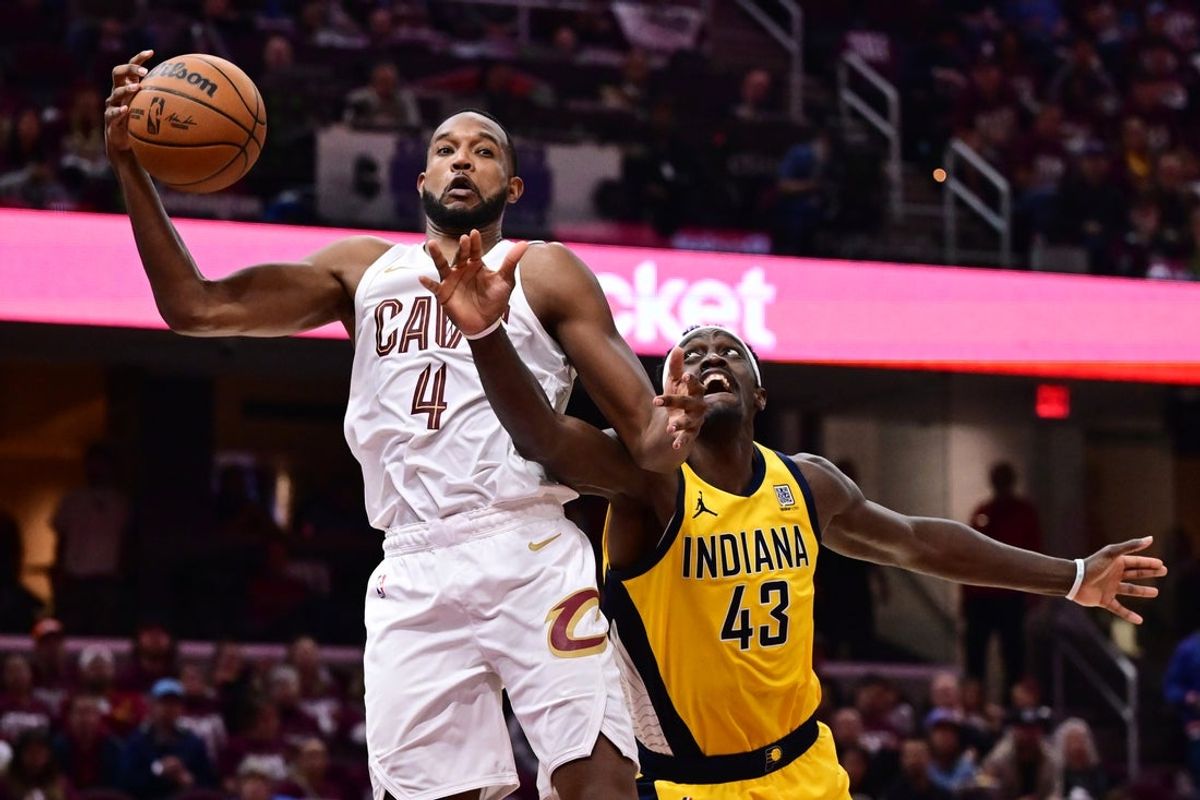 May 4, 2025; Cleveland, Ohio, USA; Cleveland Cavaliers forward Evan Mobley (4) goes for a rebound against Indiana Pacers forward Pascal Siakam (43) during the second half in game one of the second round for the 2025 NBA Playoffs at Rocket Arena. Mandatory Credit: Ken Blaze-Imagn Images
