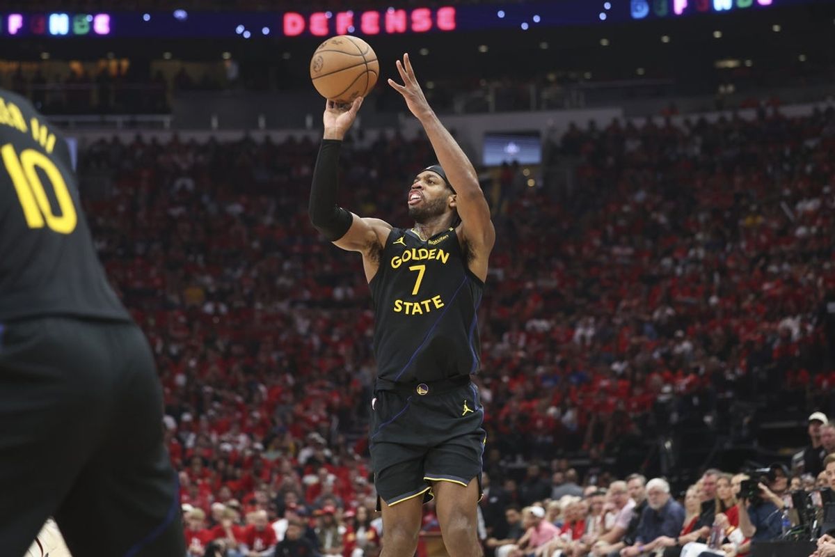 May 4, 2025; Houston, Texas, USA; Golden State Warriors guard Buddy Hield (7) shoots the ball and scores during the second quarter of game seven of the first round for the 2025 NBA Playoffs against the Houston Rockets at Toyota Center. Mandatory Credit: Troy Taormina-Imagn Images