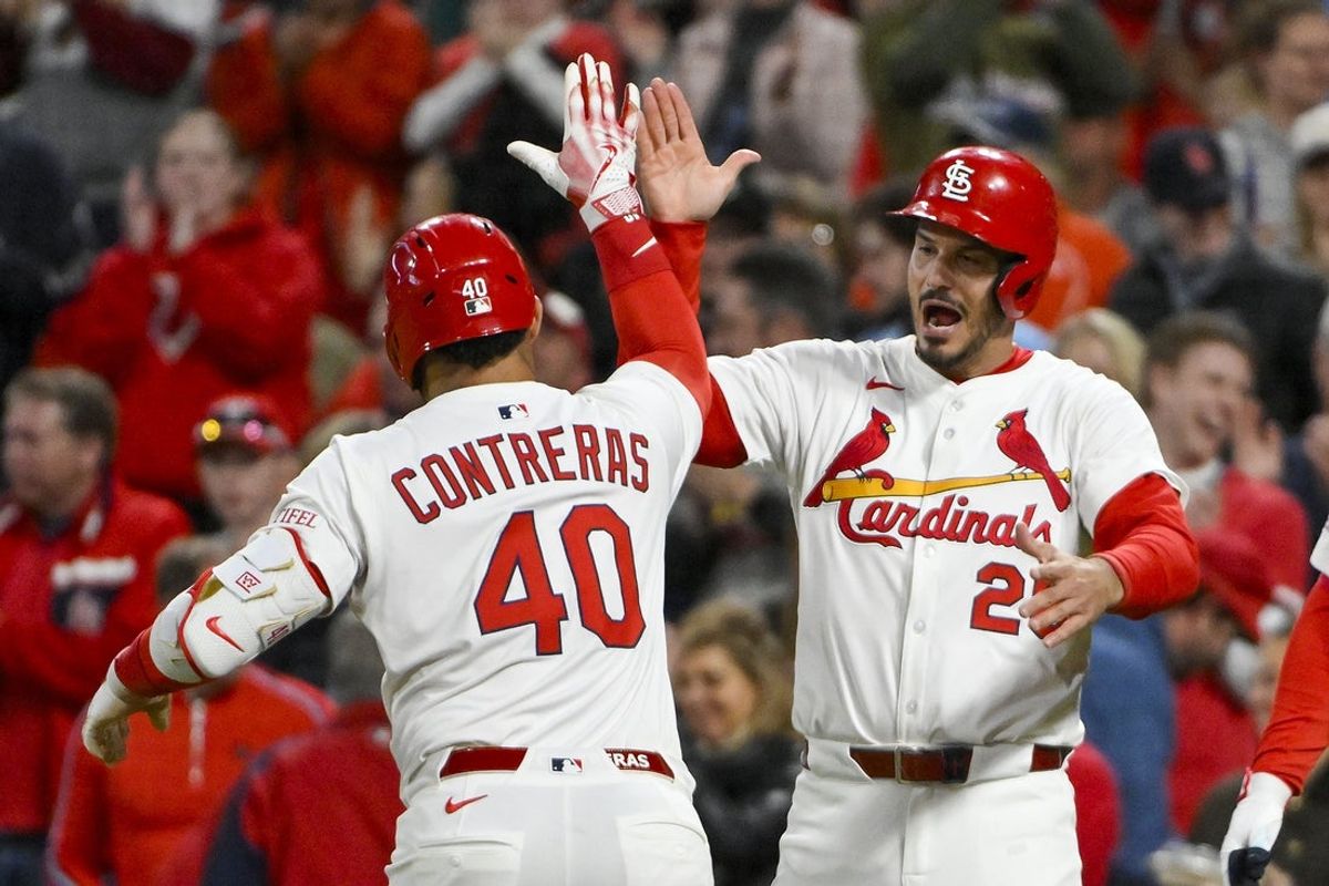May 5, 2025; St. Louis, Missouri, USA;  St. Louis Cardinals first baseman Willson Contreras (40) celebrates with third baseman Nolan Arenado (28) after hitting a two run home run against the Pittsburgh Pirates during the sixth inning at Busch Stadium. Mandatory Credit: Jeff Curry-Imagn Images