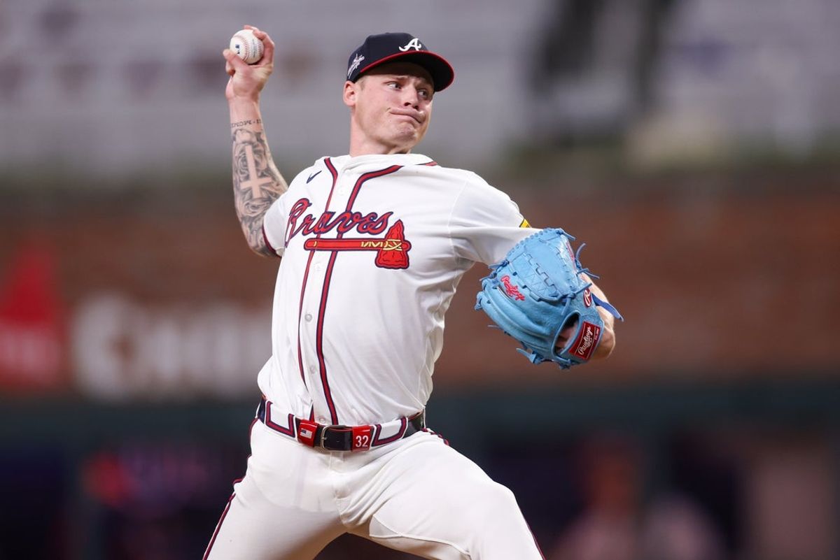 May 5, 2025; Atlanta, Georgia, USA; Atlanta Braves starting pitcher AJ Smith-Shawver (32) throws against the Cincinnati Reds in the eighth inning at Truist Park. Mandatory Credit: Brett Davis-Imagn Images