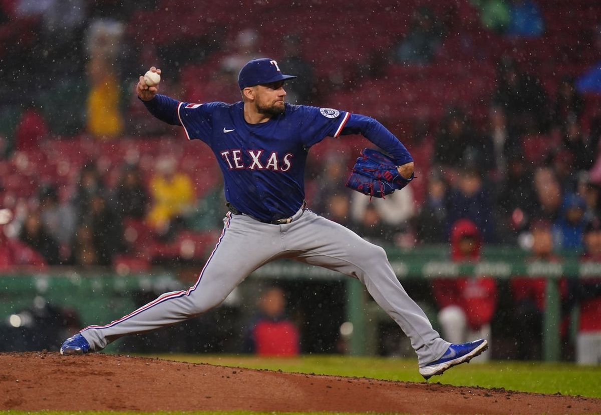 May 6, 2025; Boston, Massachusetts, USA; Texas Rangers pitcher Nathan Eovaldi (17) throws a pitch against the Boston Red Sox in the first inning at Fenway Park. Mandatory Credit: David Butler II-Imagn Images