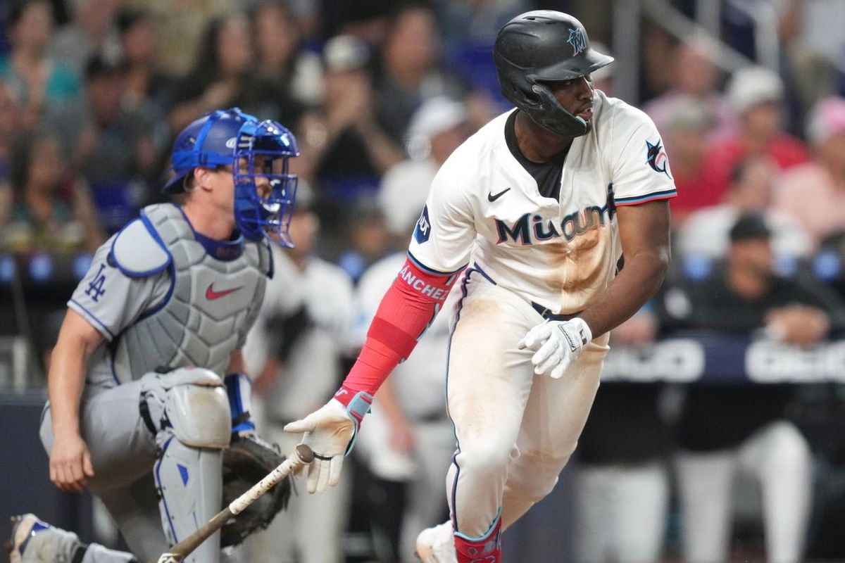 May 6, 2025; Miami, Florida, USA;  Miami Marlins right fielder Jesús Sánchez (7) hits a walk-off single in the tenth inning against the Los Angeles Dodgers at loanDepot Park. Mandatory Credit: Jim Rassol-Imagn Images