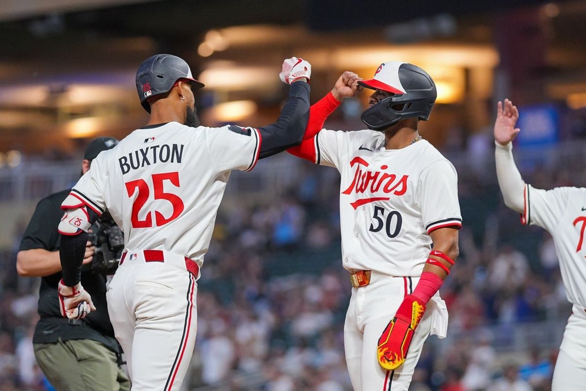 May 6, 2025; Minneapolis, Minnesota, USA; Minnesota Twins outfielder Byron Buxton (25) celebrates his home run with outfielder Willi Castro (50) against the Baltimore Orioles in the seventh inning at Target Field. Mandatory Credit: Brad Rempel-Imagn Images
