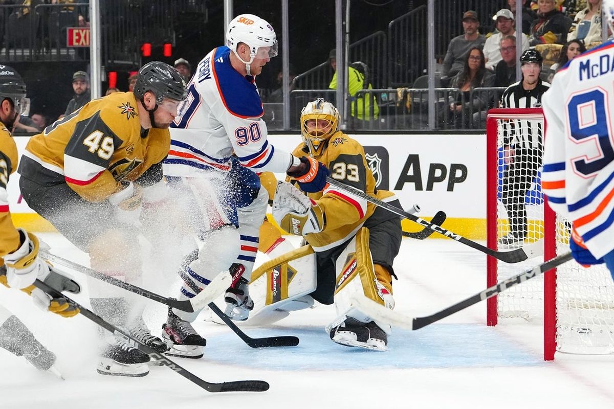 May 6, 2025; Las Vegas, Nevada, USA; Edmonton Oilers right wing Corey Perry (90) scores a goal against Vegas Golden Knights goaltender Adin Hill (33) during the first period of game one of the second round of the 2025 Stanley Cup Playoffs at T-Mobile Arena. Mandatory Credit: Stephen R. Sylvanie-Imagn Images