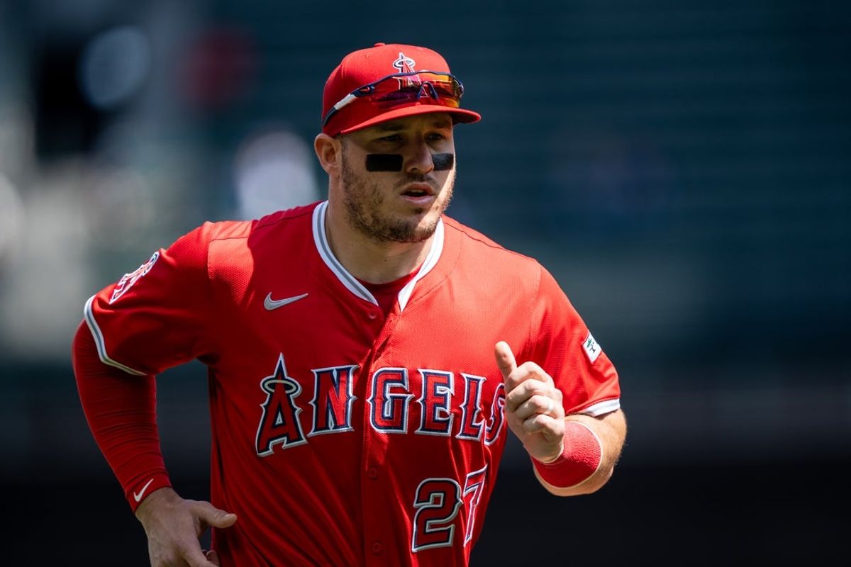 Apr 30, 2025; Seattle, Washington, USA;  Los Angeles Angels right fielder Mike Trout (27) jogs off the field before a game against the Seattle Mariners at T-Mobile Park. Mandatory Credit: Stephen Brashear-Imagn Images