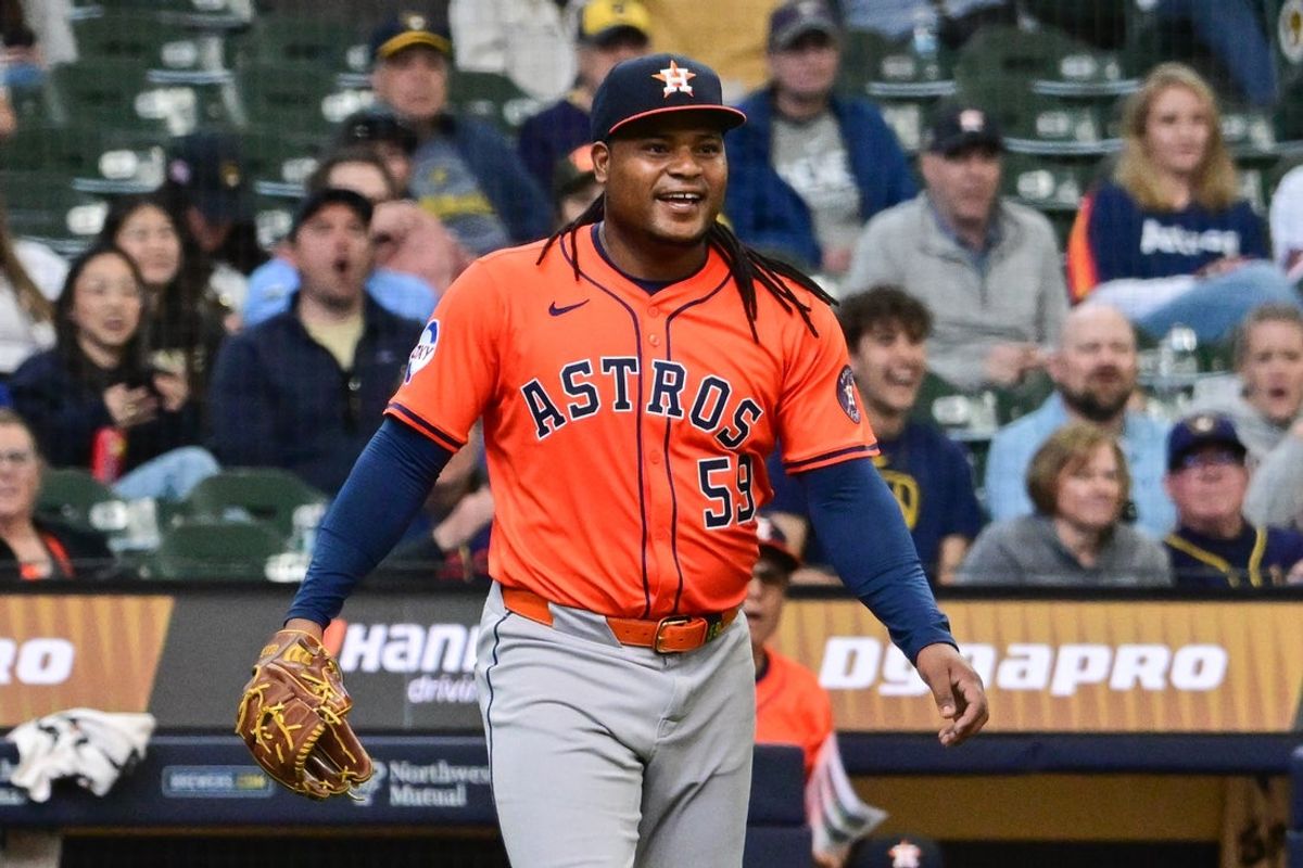 May 7, 2025; Milwaukee, Wisconsin, USA;  Houston Astros starting pitcher Framber Valdez (59) reacts after throwing out Milwaukee Brewers third baseman Vinny Capra (not pictured) in the seventh inning at American Family Field. Mandatory Credit: Benny Sieu-Imagn Images