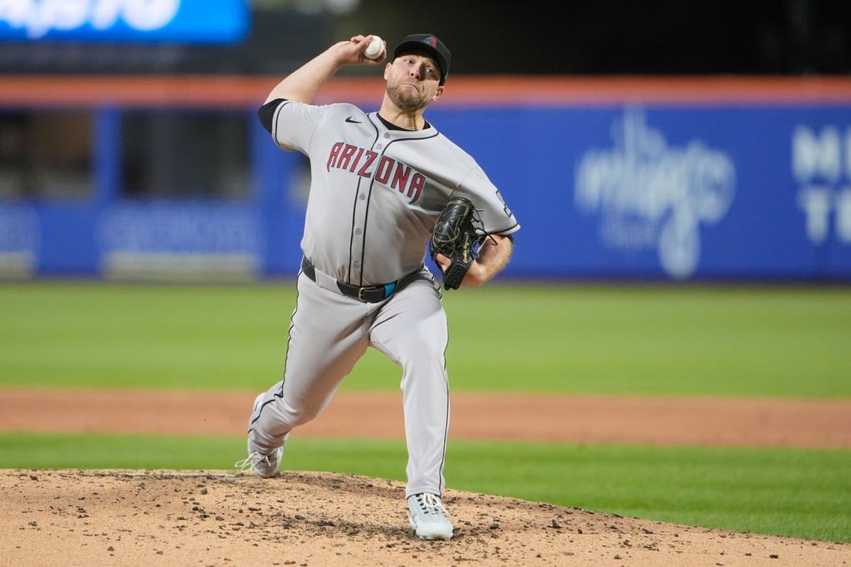 Apr 30, 2025; New York City, New York, USA; Arizona Diamondbacks pitcher Corbin Burnes (39) delivers a pitch against the New York Mets during the third inning at Citi Field. Mandatory Credit: Gregory Fisher-Imagn Images