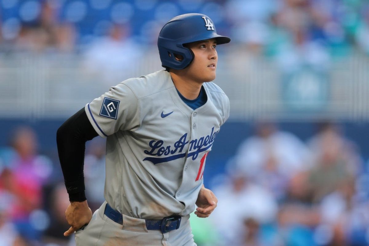 May 5, 2025; Miami, Florida, USA; Los Angeles Dodgers designated hitter Shohei Ohtani (17) walks against the Miami Marlins during the third inning at loanDepot Park. Mandatory Credit: Sam Navarro-Imagn Images