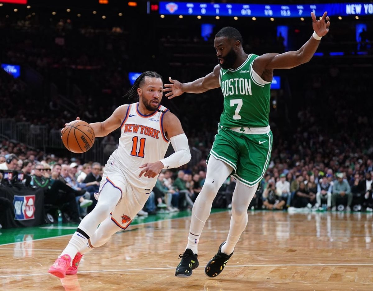 May 7, 2025; Boston, Massachusetts, USA; New York Knicks guard Jalen Brunson (11) drives the ball against Boston Celtics guard Jaylen Brown (7) in the first quarter during game two of the second round for the 2025 NBA Playoffs at TD Garden. Mandatory Credit: David Butler II-Imagn Images