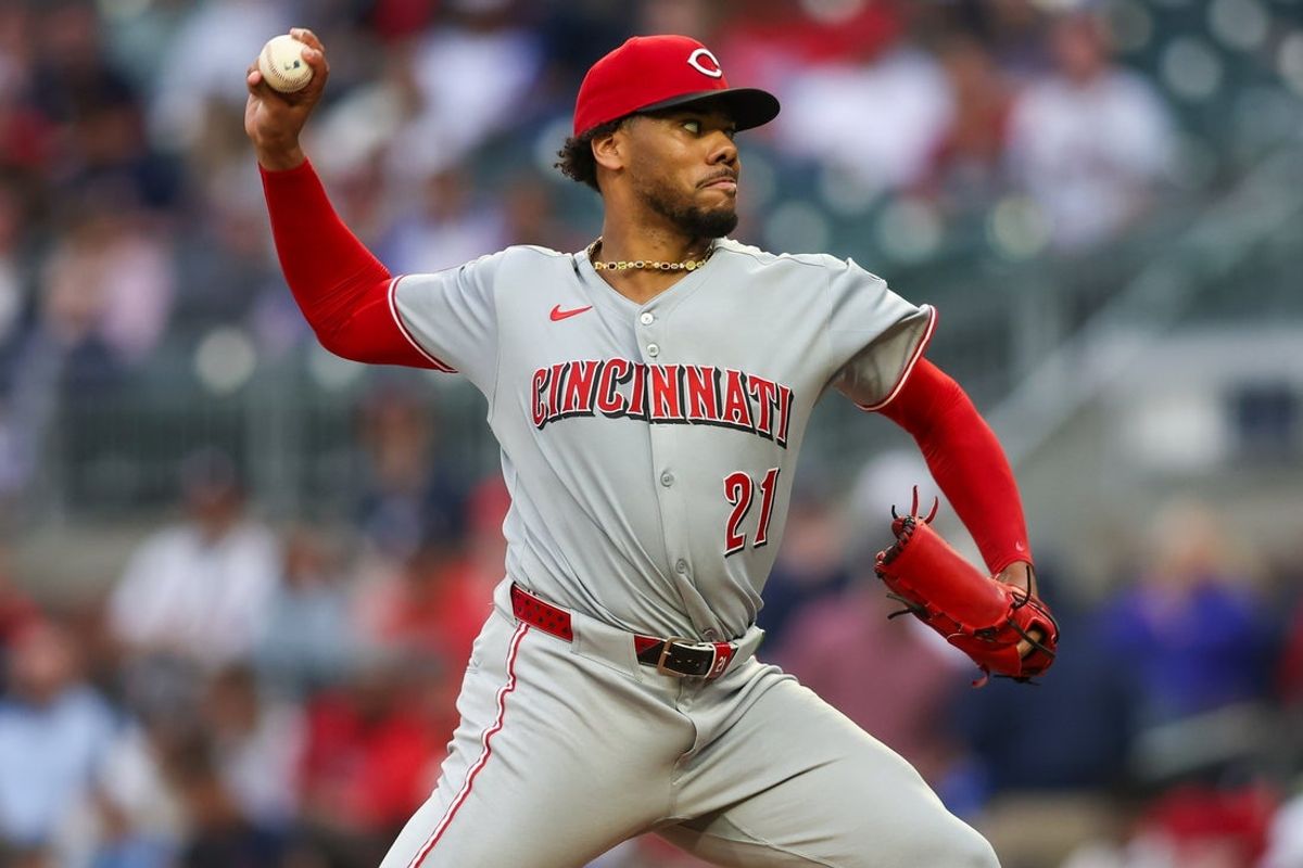 May 7, 2025; Atlanta, Georgia, USA; Cincinnati Reds starting pitcher Hunter Greene (21) throws against the Atlanta Braves in the second inning at Truist Park. Mandatory Credit: Brett Davis-Imagn Images