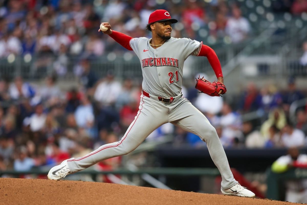 May 7, 2025; Atlanta, Georgia, USA; Cincinnati Reds starting pitcher Hunter Greene (21) throws against the Atlanta Braves in the second inning at Truist Park. Mandatory Credit: Brett Davis-Imagn Images