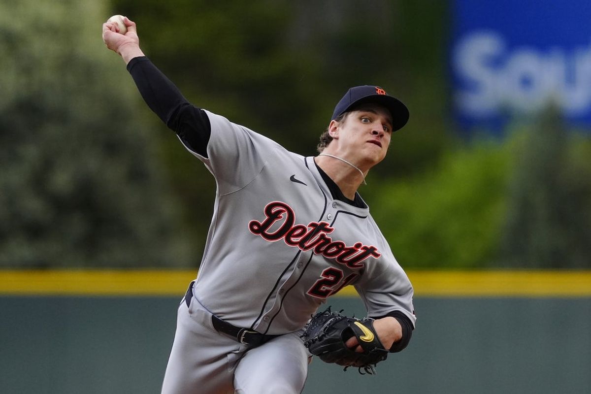 May 7, 2025; Denver, Colorado, USA; Detroit Tigers starting pitcher Jackson Jobe (21) delivers a pitch in the first inning against the Colorado Rockies at Coors Field. Mandatory Credit: Ron Chenoy-Imagn Images