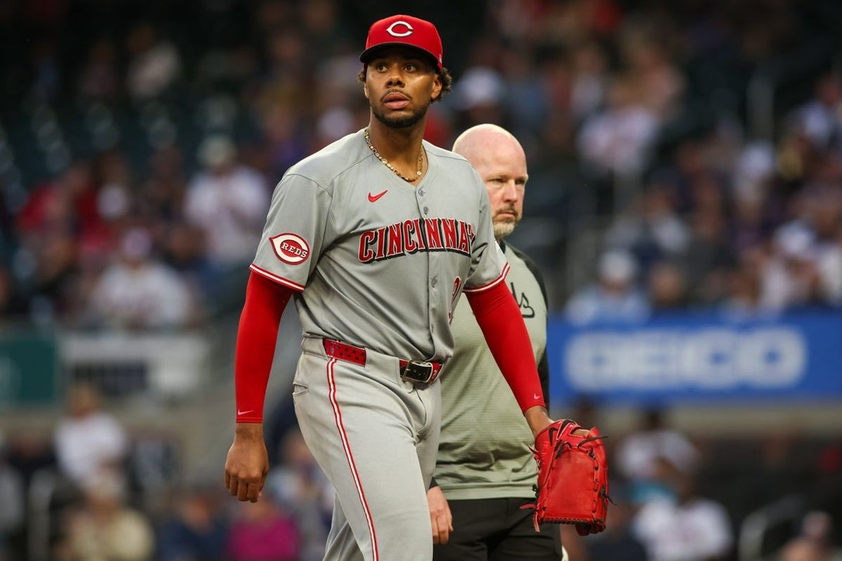 May 7, 2025; Atlanta, Georgia, USA; Cincinnati Reds starting pitcher Hunter Greene (21) leaves the game with an injury against the Atlanta Braves in the fourth inning at Truist Park. Mandatory Credit: Brett Davis-Imagn Images