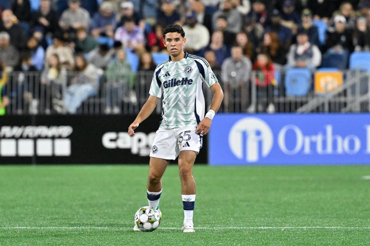 May 7, 2025; Pawtucket, Rhode Island, USA; New England Revolution midfielder Cristiano Oliveira (35) controls the ball against the Rhode Island FC during the second half at Centreville Bank Stadium. Mandatory Credit: Eric Canha-Imagn Images
