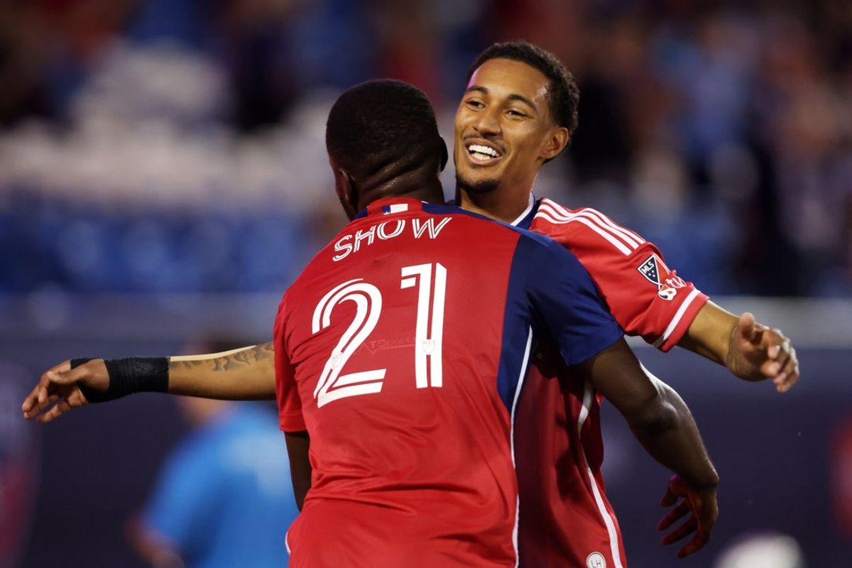 May 7, 2025; Frisco, Texas, USA; FC Dallas midfielder Pedrinho (20) celebrates a goal against AV ALTA FC with midfielder Pedrinho (20) during the second half at Toyota Stadium. Mandatory Credit: Tim Heitman-Imagn Images