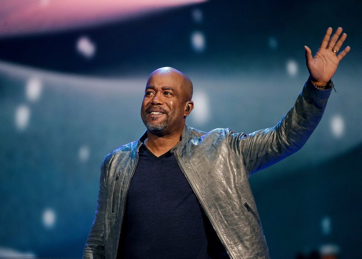 Darius Rucker waves after finishing a song during the taping of the annual CMA Country Christmas at the Grand Ole Opry House on Nov. 7, 2015.