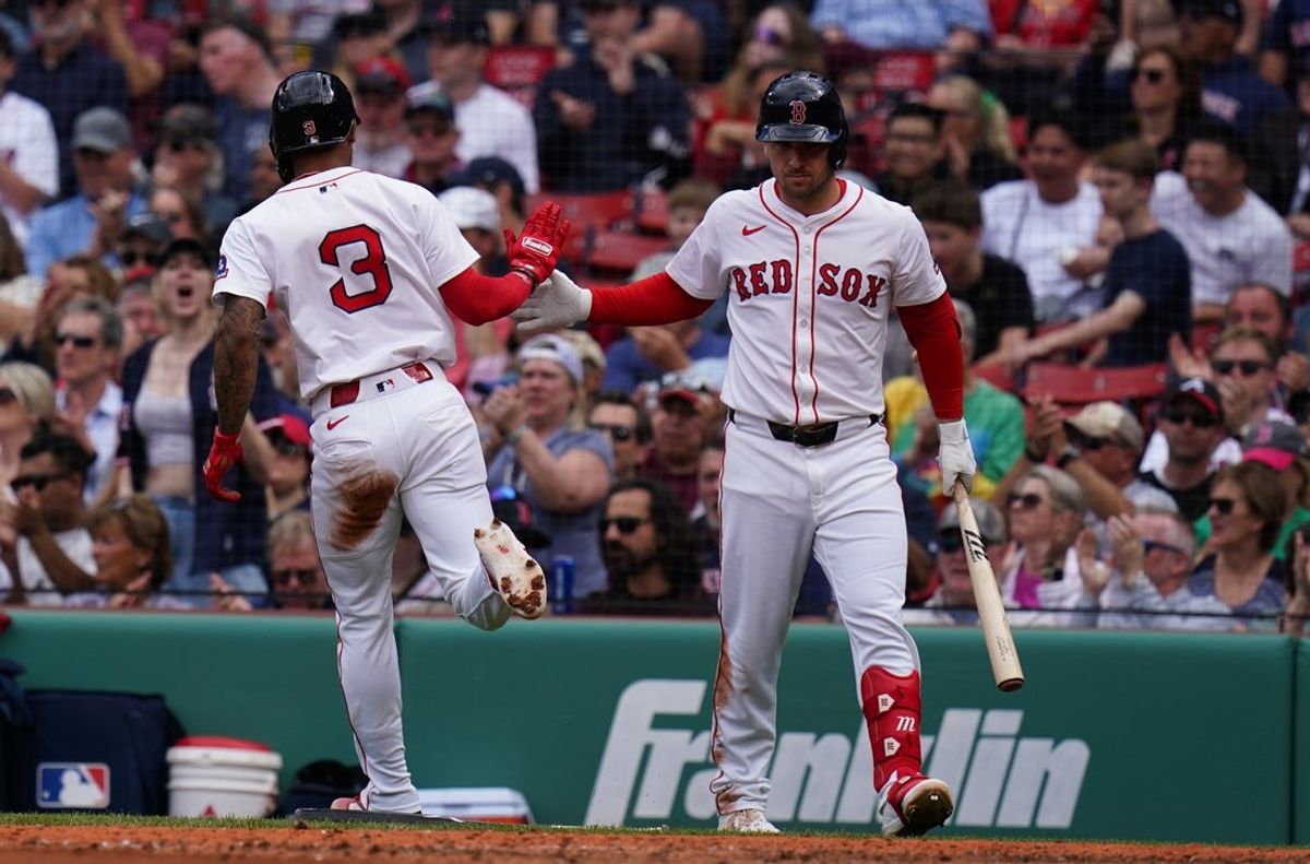 May 8, 2025; Boston, Massachusetts, USA; Boston Red Sox outfielder Ceddanne Rafaela (3) scores against the Texas Rangers in the fifth inning at Fenway Park. Mandatory Credit: David Butler II-Imagn Images