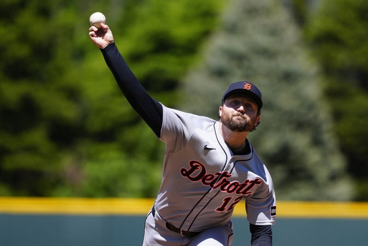 May 8, 2025; Denver, Colorado, USA; Detroit Tigers starting pitcher Casey Mize (12) delivers a pitch in the first inning against the Colorado Rockies at Coors Field. Mandatory Credit: Ron Chenoy-Imagn Images