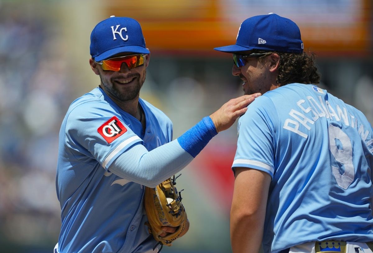 May 8, 2025; Kansas City, Missouri, USA; Kansas City Royals second baseman Michael Massey (19) and first baseman Vinnie Pasquantino (9) react after a double play during the fourth inning against the Chicago White Sox at Kauffman Stadium. Mandatory Credit: Jay Biggerstaff-Imagn Images